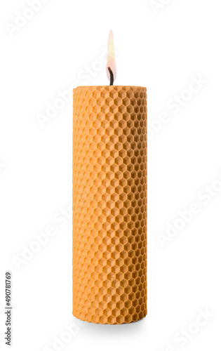 Burning wax candle isolated on white background photo