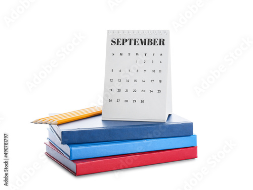 Stack of notebooks, pencils...
