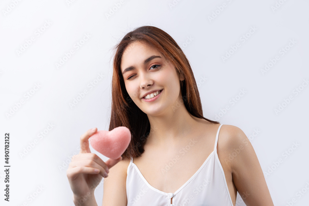Beautiful smiling woman with clean skin, natural make-up and white teeth on a gray background Beautiful smiling woman with clean skin, natural make-up and white teeth on a gray background