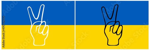 A gesture of victory and solidarity against the national colors of the flag of Ukraine.