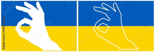 Gesture all right against the national colors of the flag of Ukraine.