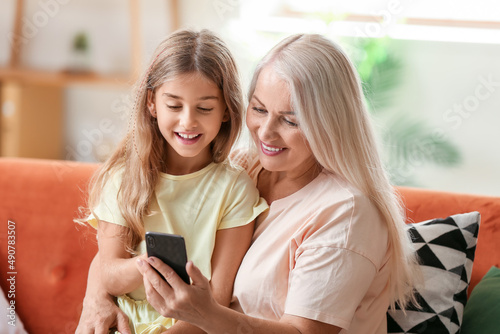 Little girl with her grandm...