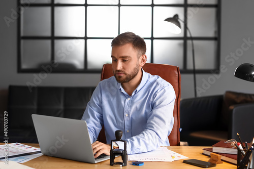 Male notary public working ...