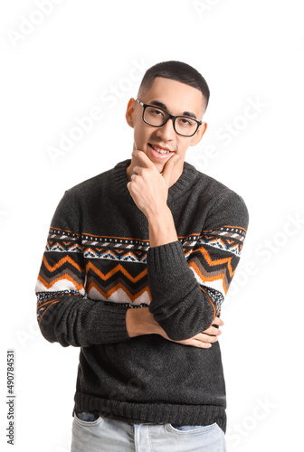 Thoughtful young asian man ...