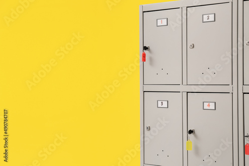 Modern locker near yellow wall