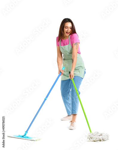 Young woman with floor mops isolated on white