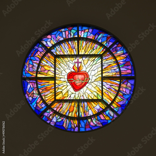 Fototapeta Sacred Heart of Jesus round stained glass window inside the Co-Cathedral of the