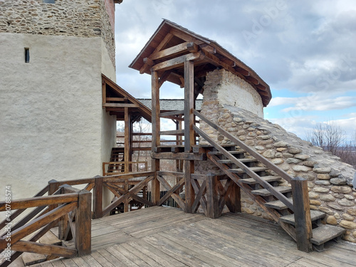 Beautiful view of part of the Medieval Fortress Malaiesti museum on a cloudy day in Romania photo