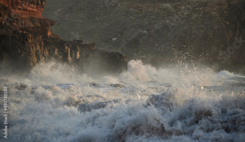 Canvas-taulu View of raging sea waves beating a rocky cliff at the coast on the mountain area