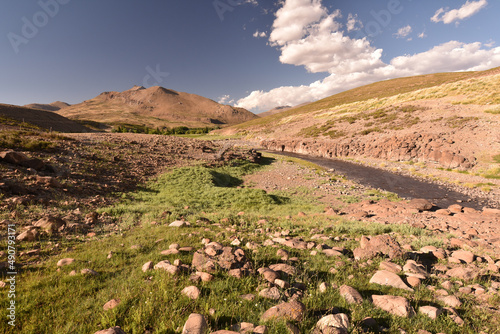 Beautiful landscape with the mountains against the blue sky. photo