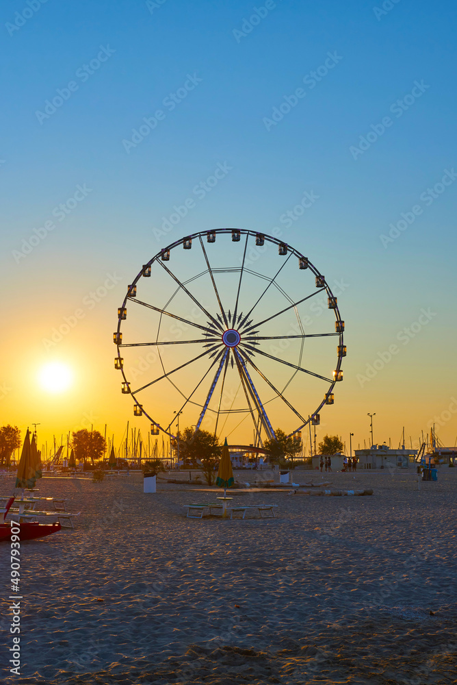 Rimini ferris wheel at sunset