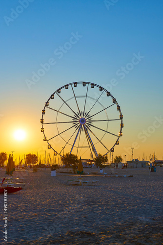 Rimini ferris wheel at sunset