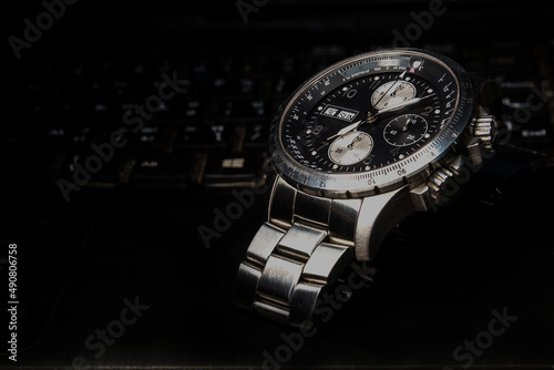 Close up of stainless steel chronograph watch