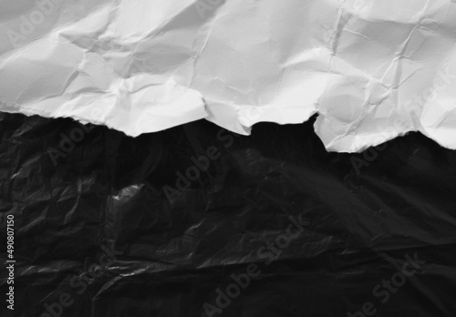 Fototapeta Naklejka Na Ścianę i Meble -  ripped paper isolated on black background.