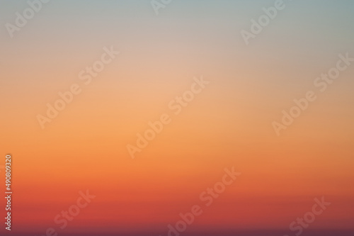 Tranquil background of red and orange gradient sky Fototapet