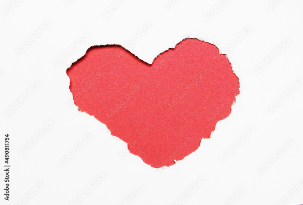 Red hole heart in white paper background