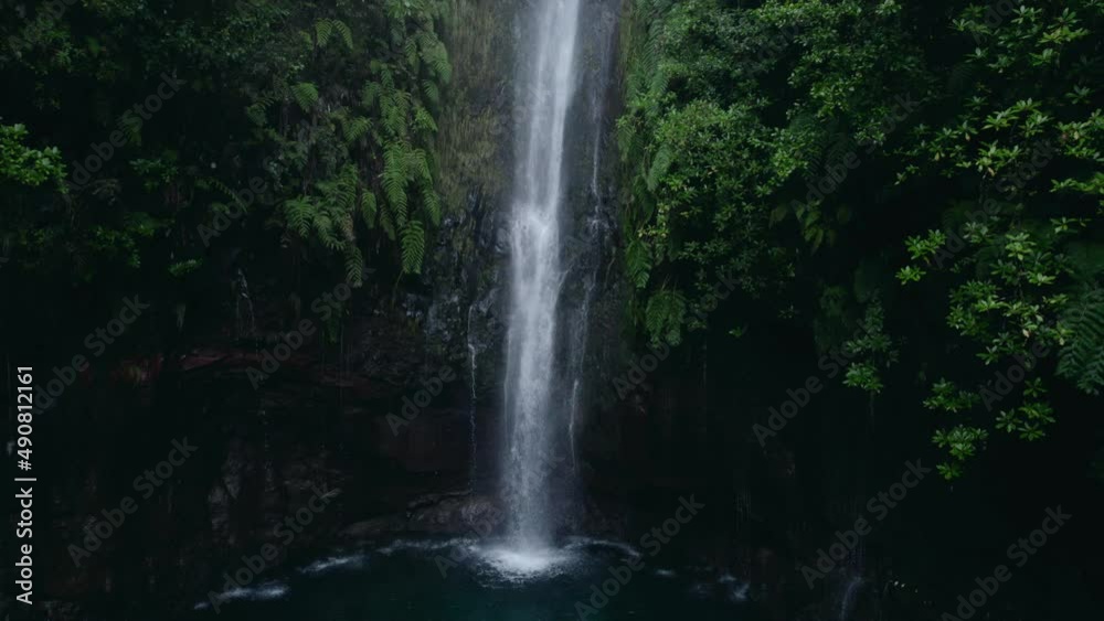 Beautiful waterfall in green forest, top view. Tropical in mountain jungle. Waterfall in the tropical forest. Big Small in 4k 30 FPS Beautiful waterfall in green forest, top view. Tropical in mountain jungle. Waterfall in the tropical forest. Big Small in 4k 30 FPS