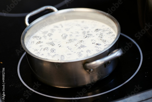 the process of boiling morel mushrooms in milk