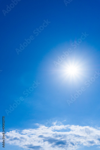 Background material of sun flare and refreshing blue sky and clouds_wide_01