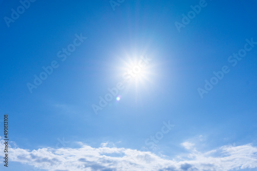 Background material of sun flare and refreshing blue sky and clouds_wide_13