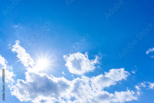 Background material of sun flare and refreshing blue sky and clouds_wide_20