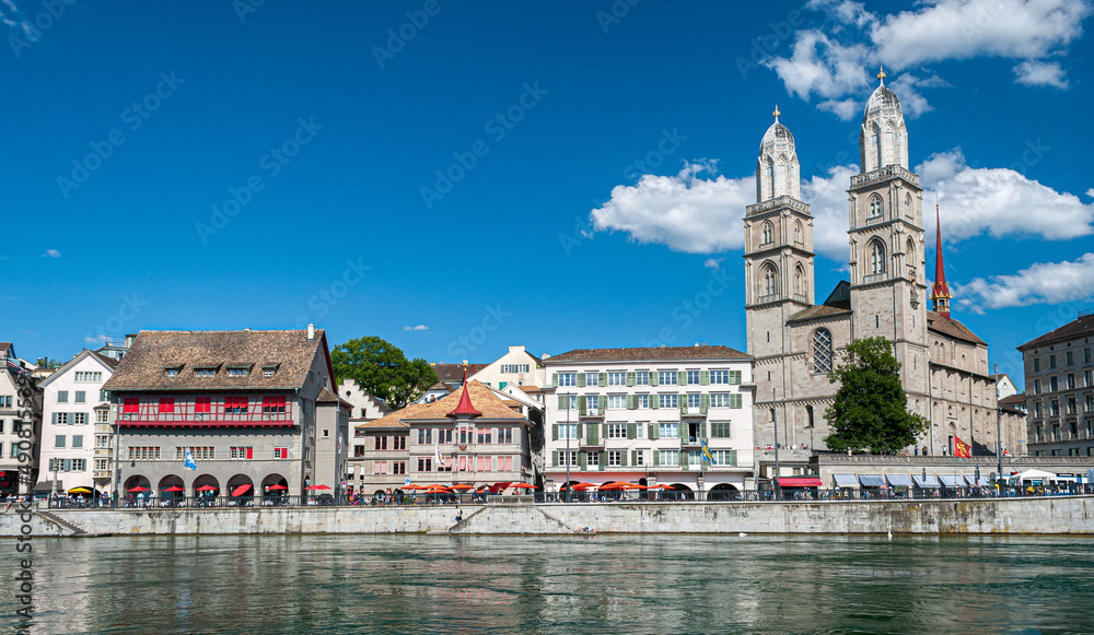 Skyline of Zurich with the river Limmat in the foreground and the cathedral in the background
