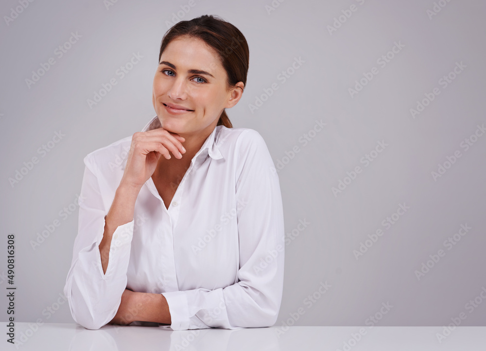 All natural smile. Studio portrait of an attractive young woman. All natural smile. Studio portrait of an attractive young woman.