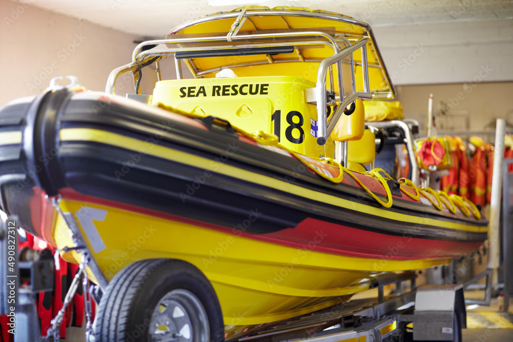 The life guards trusty vessel. Cropped shot of a sea rescue boat inside a lifeguard station.