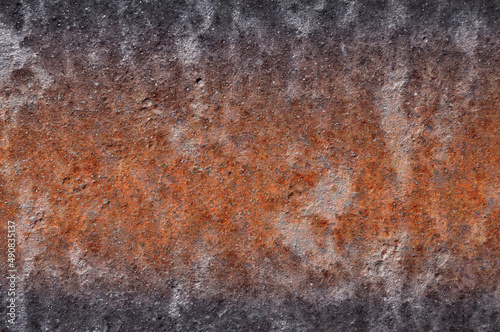 The texture of the old burnt iron completely covered with red corrosion