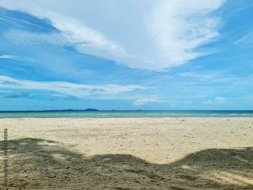 Shade and beach on fine days clear sky. The atmosphere is quiet, suitable for traveling in summer. Shade and beach on fine days clear sky. The atmosphere is quiet, suitable for traveling in summer.