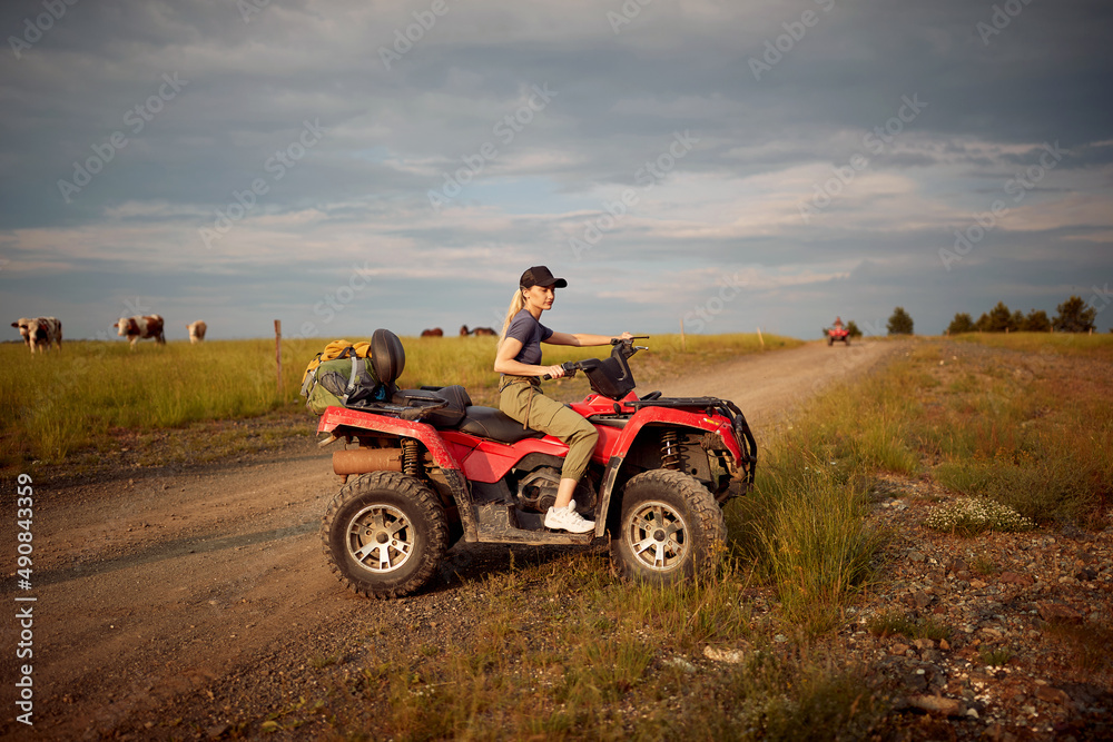 Girl driving off-road and enjoying on extreme riding Girl driving off-road and enjoying on extreme riding