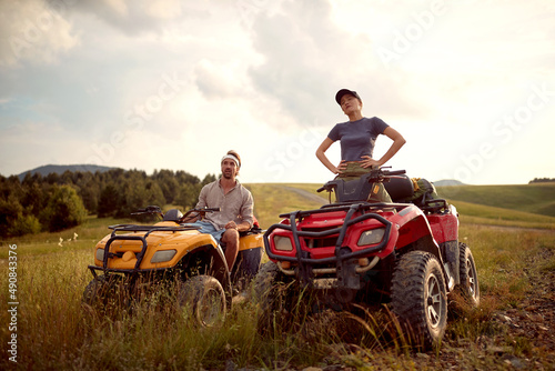 Man and woman driving off-road and enjoying on extreme riding