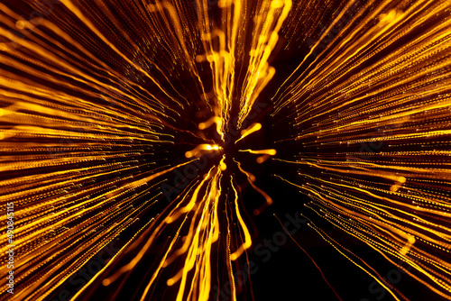 Festive lights in motion as an abstract background.