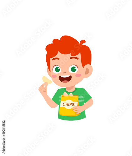 little boy eat potato chips and feel happy