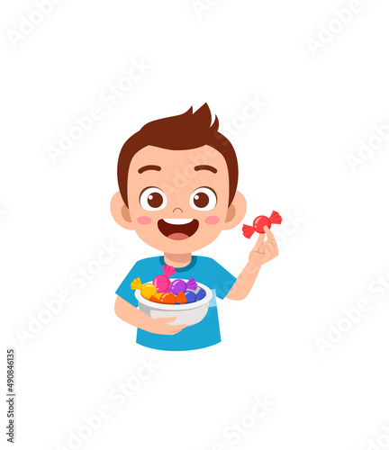 little boy eat sweet candy and feel happy