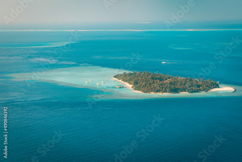 Fantastic aerial landscape, luxury tropical resort or hotel with water villas and beautiful beach scenic. Amazing bird eyes view in Maldives, landscape seascape aerial view over Maldives, traveling © icemanphotos