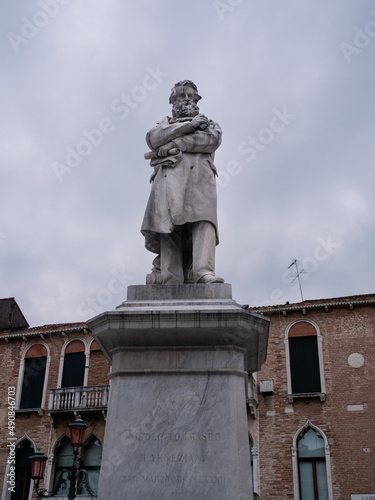 Nicolo Tommaseo Statue on Campo San Stefano in Venice, Italy, made by Francesco Barzaghi in 1882 with inscription 'To Nicolo Tommaseo from the Venetians 22 March 1882'. photo