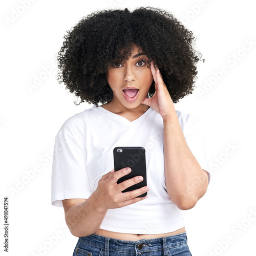 OMG, guess who just followed me. Studio shot of an attractive young woman using a smartphone and looking shocked against a white background.