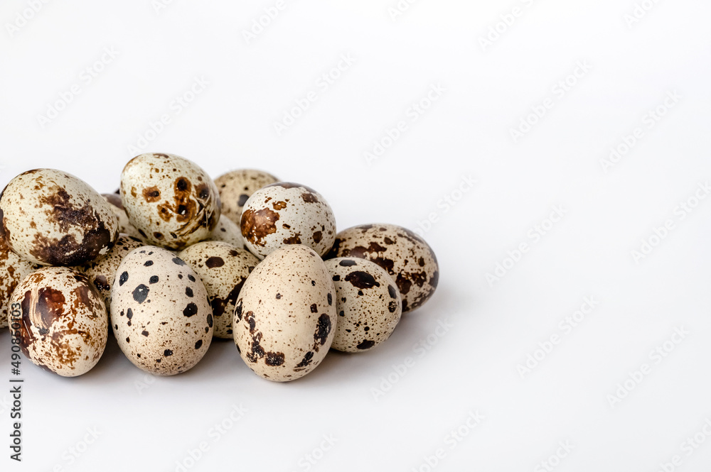 quail eggs on white background. Home cooking. The idea of healthy breakfast, symbol of Easter. Copy space