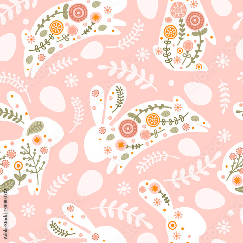 Seamless pattern with Easter eggs, rabbit and flowers in flat style. Illustration with silhouettes hares and eggs in pastel colors for fabric, wallpaper and textiles. Vector
