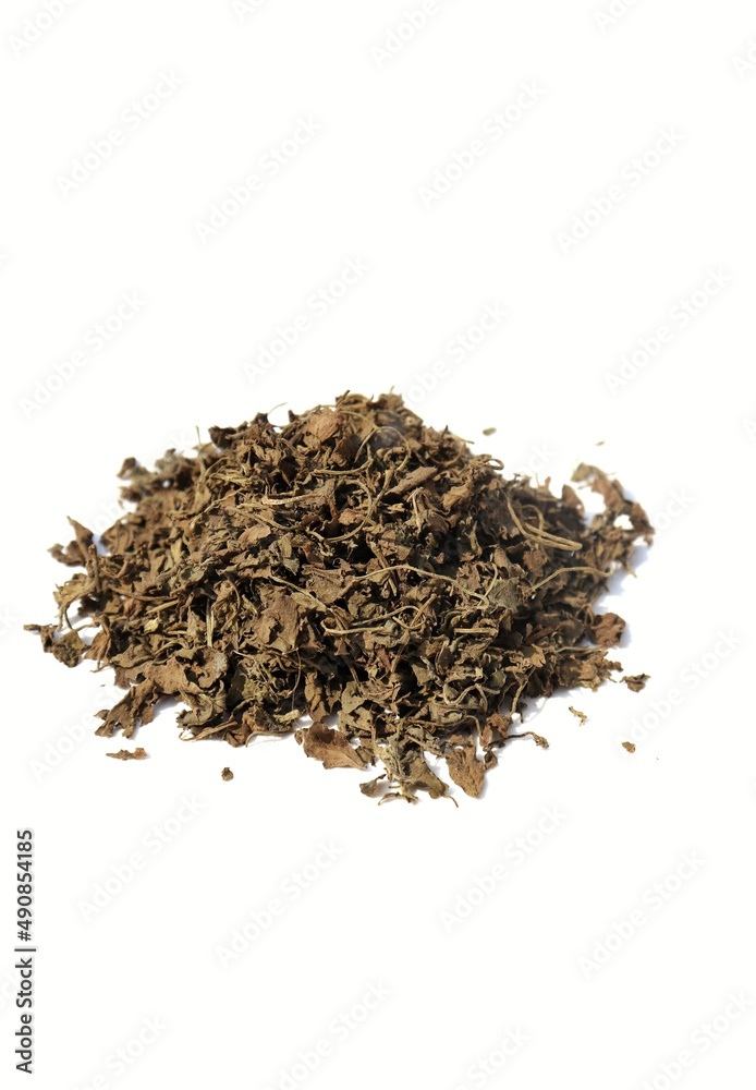 Closeup of Dry Methi or Fenugreek Leaves in a Wooden Ladle Isolated on Wooden Background with Copy Space Closeup of Dry Methi or Fenugreek Leaves in a Wooden Ladle Isolated on Wooden Background with Copy Space