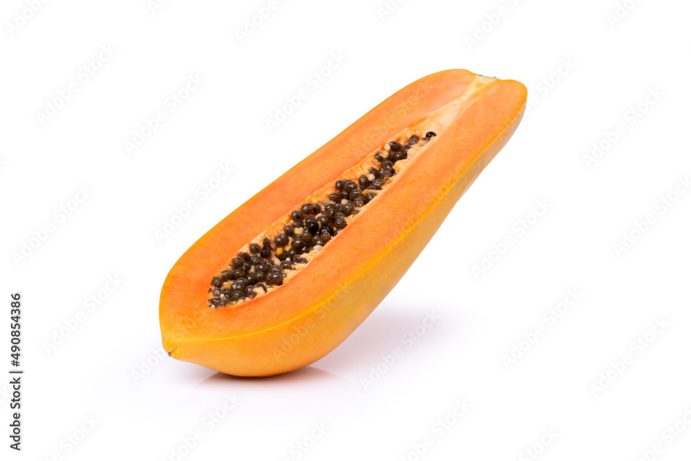 Half of ripe papaya fruit isolated on white background with clipping path. Half of ripe papaya fruit isolated on white background with clipping path.