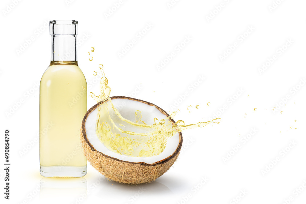 Coconut oil splash from coco nut fruit isolated on white background. Copy space. Coconut oil splash from coco nut fruit isolated on white background. Copy space.