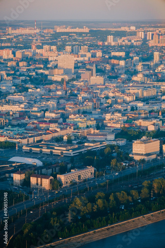 Panoramic summer shot from above of Kazan city. Capital of the Tatarstan, Russia. City centre and landmark. Residential buildings and attractions. Kazanka river, Bauman street, cars, hotels. Torism. 