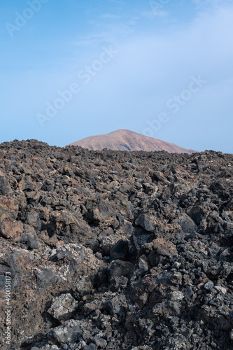 Caldera Blanca volcano seen from the lava  Timanfaya  Canary Islands  Lanzarote  Spain