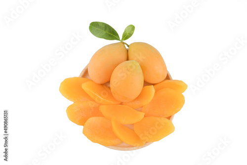 Maprang, maprang, peeled on a wooden plate on a white background.