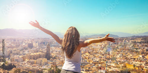 Canvastavla woman traveler looking at city landscape view panorama- Malaga
