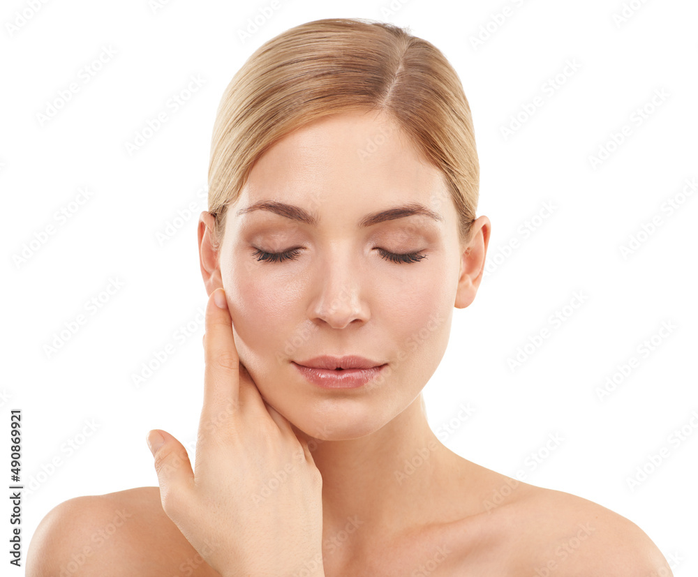 Feeling the freshness on her face. Cropped studio shot of a beautiful woman touching her face. Feeling the freshness on her face. Cropped studio shot of a beautiful woman touching her face.