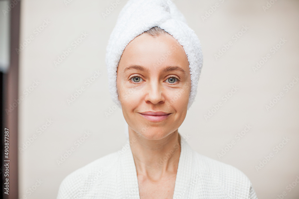 portrait of gorgeous happy middle age woman looking at camera portrait of gorgeous happy middle age woman looking at camera