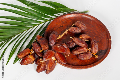 Dried dates (fruit of Phoenix dactylifera dates). Clipping paths for both the object and the shadow. Infinite depth of field, retouched. Set, bundle, photo